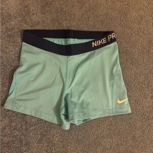 Nike Pro Women's in Teal and Black